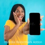 excited-african-american-lady-showing-phone-screen-blue-background-blank-advertising-amazing-app-smartphone-posing-new-224712718